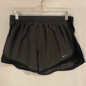 gray nike shorts size medium women’s